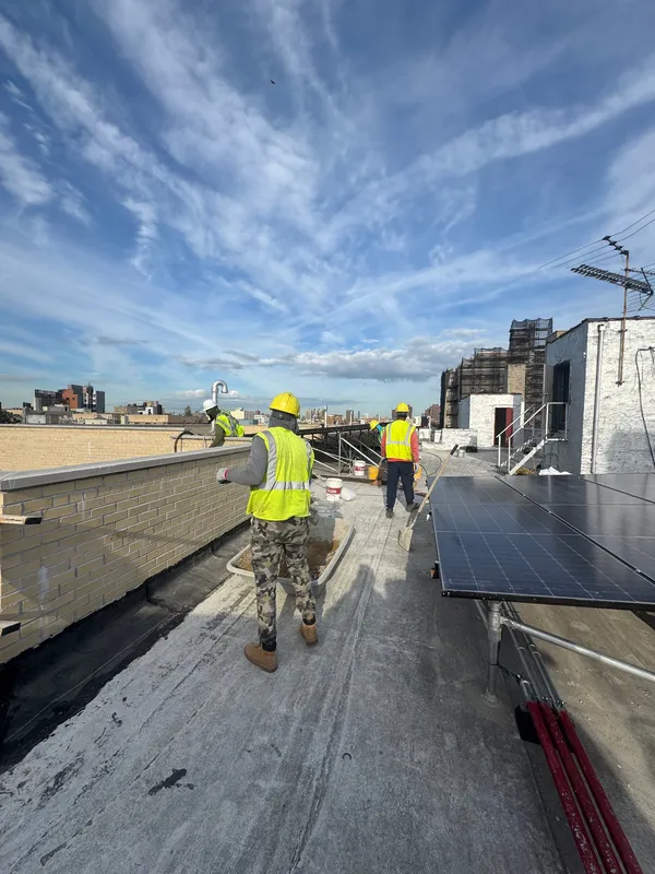 Solar panel installation on a Nassau County commercial rooftop